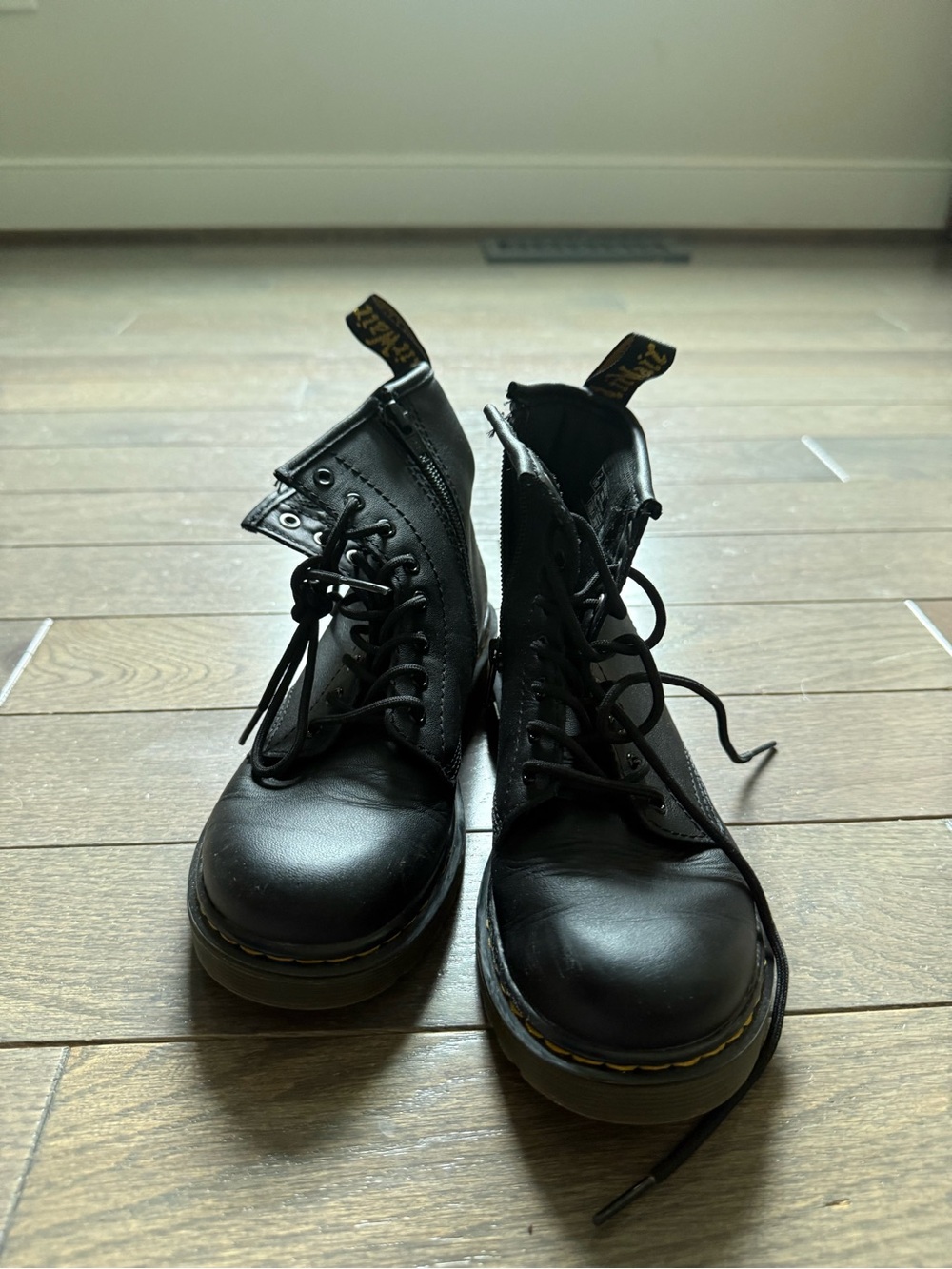 Dr. Martens Black Leather Lace-Up Boots with Yellow Stitching
